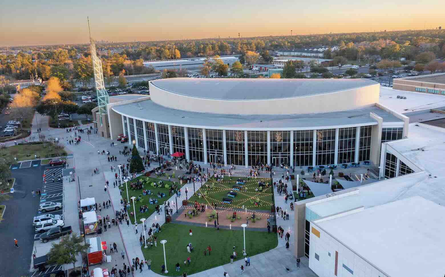 Exterior shot of Champion Forest Church with people