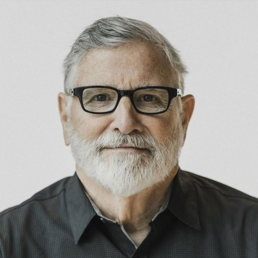 Older man with glasses and white beard