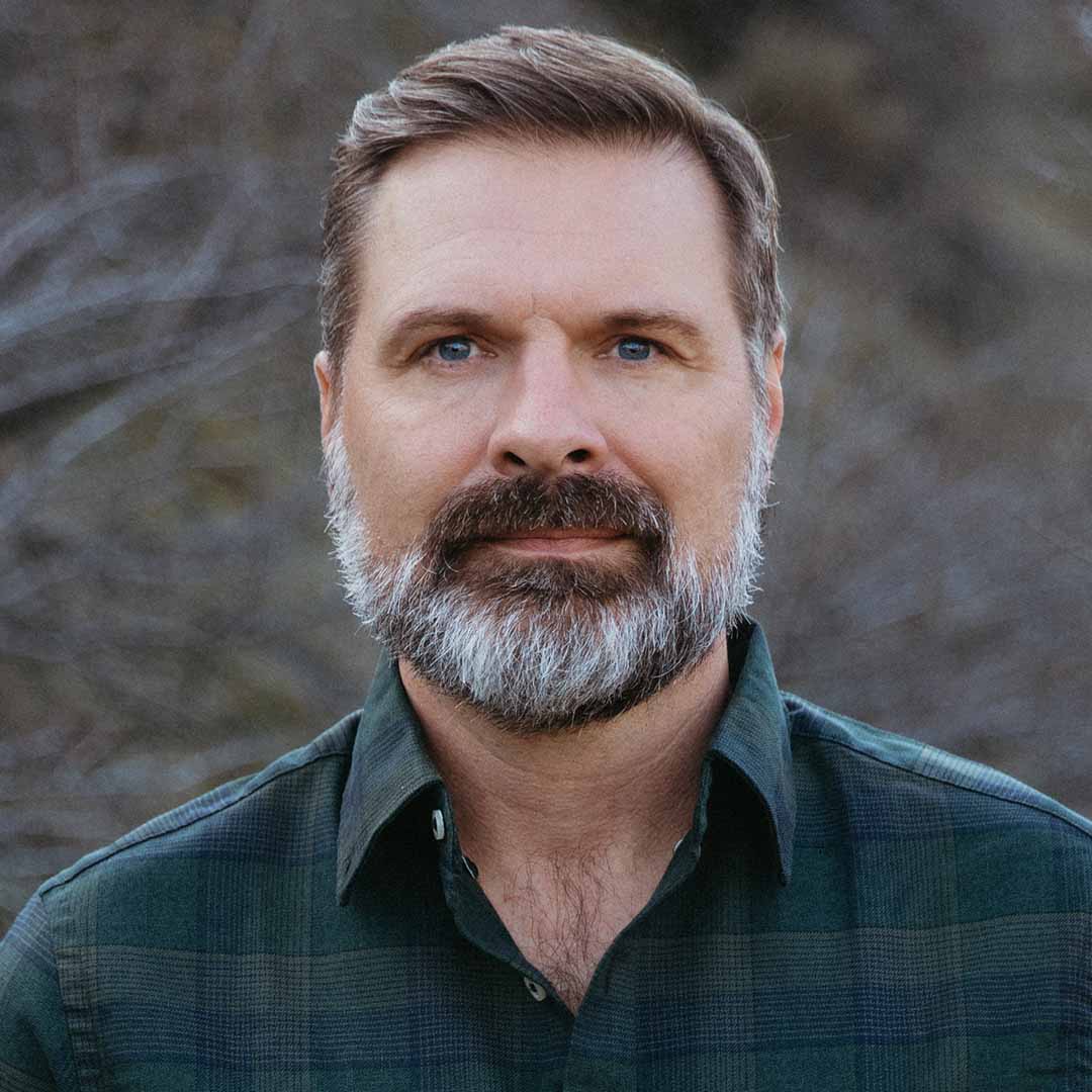 Headshot of Mac Powell Outside